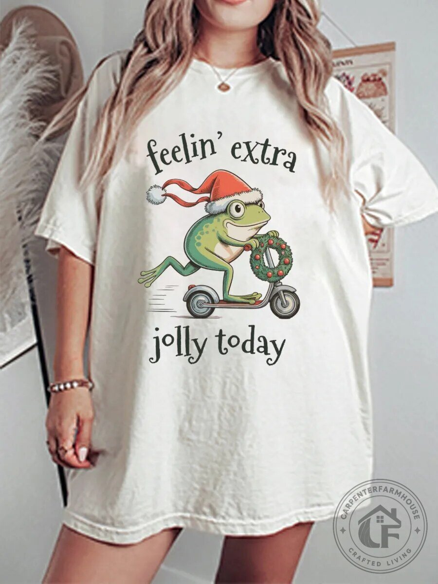 Feeling Extra Jolly Today Christmas Frog Riding Scooter Graphic T-Shirt